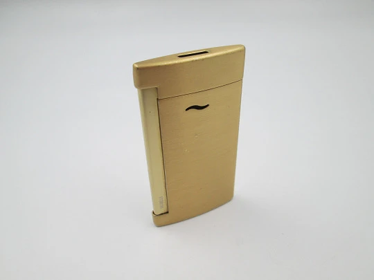 S.T. Dupont Paris Slim 7 torch flame gas lighter. Gold plated metal. France. 2020's S.T. Dupont Paris Slim 7 torch flame gas lighter. Gold plated metal. France. 2020's