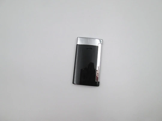S.T. Dupont Slim 7 torch flame gas lighter. Black lacquer and chrome metal. Box. 2020's S.T. Dupont Slim 7 torch flame gas lighter. Black lacquer and chrome metal. Box. 2020's