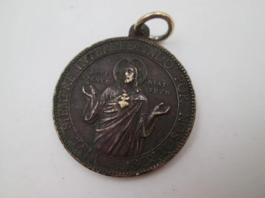 Sacred Heart of Jesus bronze medal. Ludovic Penin. Handle and ring. 1880's. Europe