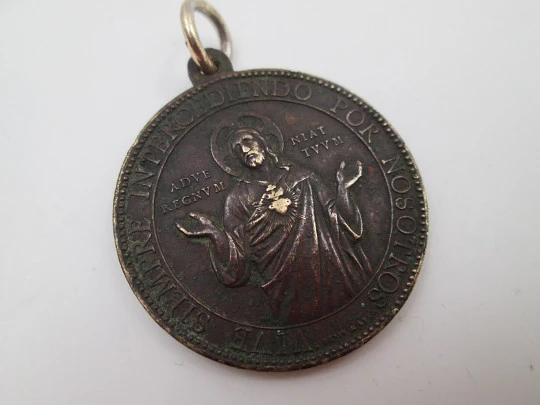 Sacred Heart of Jesus bronze medal. Ludovic Penin. Handle and ring. 1880's. Europe