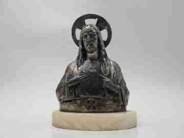 Sacred Heart of Jesus sculpture. Pewter and white marble oval stand. Spain. 1940's