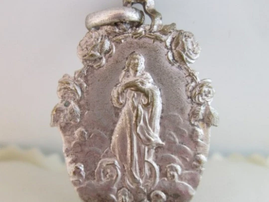 Sacred Heart of Jesus. Silver metal. Virgin Mary with cherubs