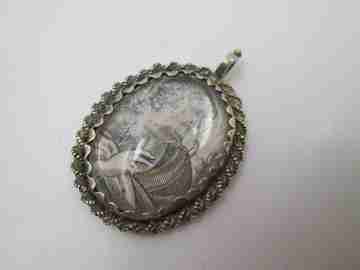 Saint Joseph oval pendant reliquary. Sterling silver & vermeil. 19th century