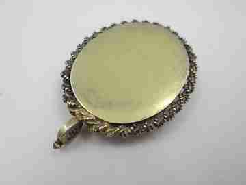 Saint Joseph oval pendant reliquary. Sterling silver & vermeil. 19th century