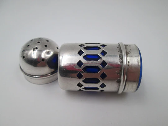 Salt & pepper shaker. 925 sterling silver and blue crystal. 1980's. Openwork design