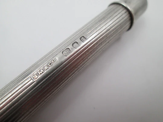 Sampson Mordan mechanical pencil. Sterling silver. United Kingdom. Lines pattern. 1910's