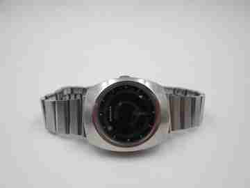Sandoz Pop Art mujer. Dial misterio. 1970. Acero. Automático. Armis