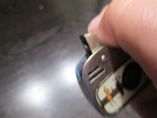 Sarome Elegance pocket petrol lighter. Silver plated brass. Egyptian scene. Japan. 1950's Sarome Elegance pocket petrol lighter. Silver plated brass. Egyptian scene. Japan. 1950's