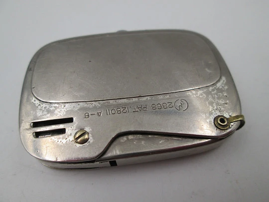 Sarome Elegance pocket petrol lighter. Silver plated brass. Egyptian scene. Japan. 1950's Sarome Elegance pocket petrol lighter. Silver plated brass. Egyptian scene. Japan. 1950's