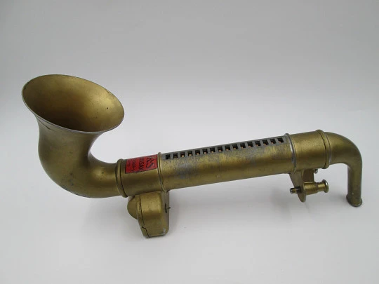 Saxofón mecánico de juguete Playasax. QRS DeVry Corporation. Metal dorado