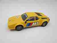 Scalextric slot car. BMW M1. Exin. 1980's. Yellow & black. Spain