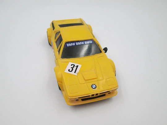 Scalextric slot car. BMW M1. Exin. 1980's. Yellow & black. Spain