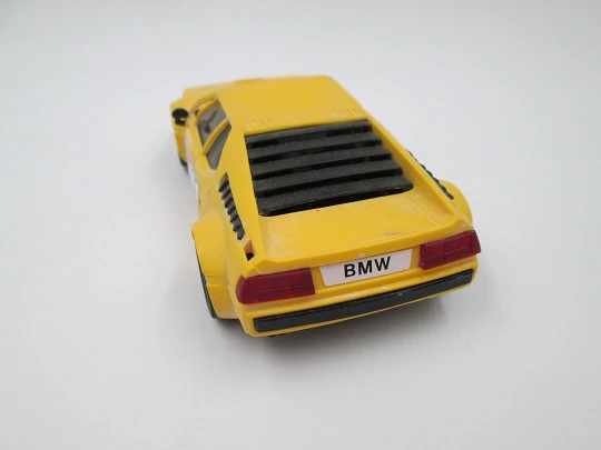 Scalextric slot car. BMW M1. Exin. 1980's. Yellow & black. Spain