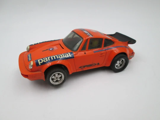 Scalextric slot car. Porsche Carrera RS. Exin. 1980's. Orange. Spain