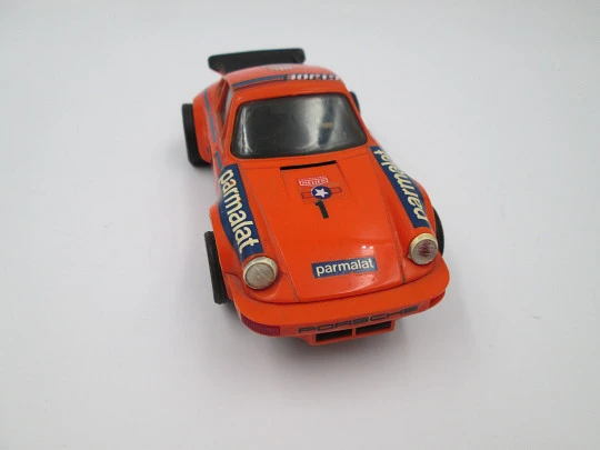 Scalextric slot car. Porsche Carrera RS. Exin. 1980's. Orange. Spain