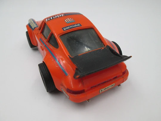 Scalextric slot car. Porsche Carrera RS. Exin. 1980's. Orange. Spain