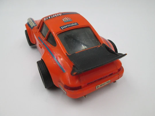 Scalextric. Coche Porsche Carrera RS. Naranja y negro. Exin. 1980