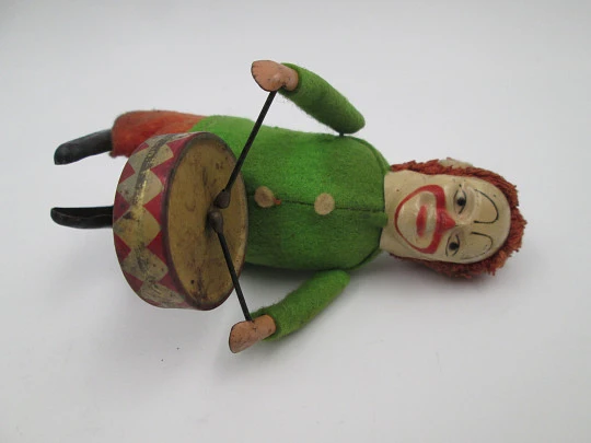 Schuco drummer clown clockwork toy. Tinplate and colours felt. Germany. 1930's