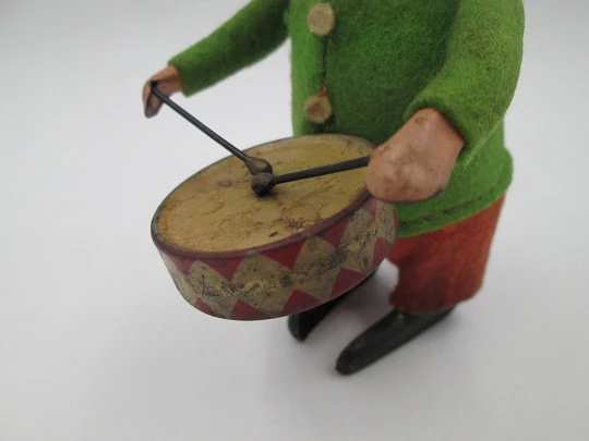 Schuco drummer clown clockwork toy. Tinplate and colours felt. Germany. 1930's