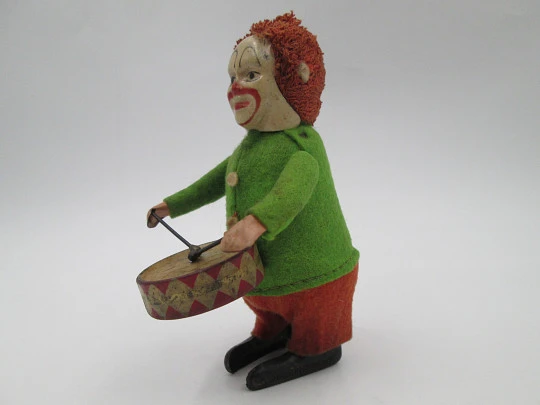 Schuco drummer clown clockwork toy. Tinplate and colours felt. Germany. 1930's