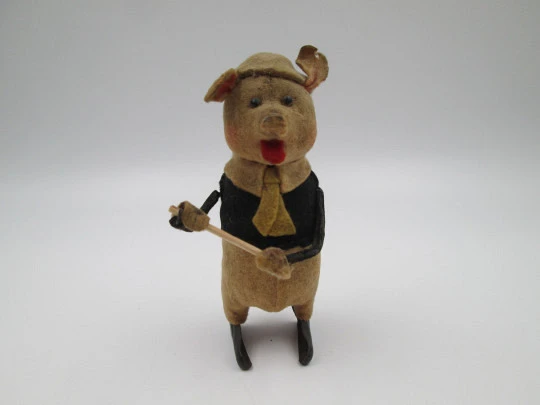 Schuco pied piper pig toy. Tinplate and colours felt. Clockwork mechanism. Germany. 1930's