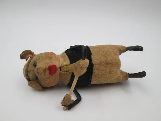 Schuco pied piper pig toy. Tinplate and colours felt. Clockwork mechanism. Germany. 1930's