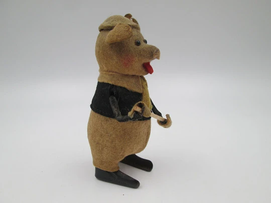 Schuco pied piper pig toy. Tinplate and colours felt. Clockwork mechanism. Germany. 1930's