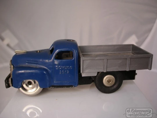 Schuco Varianto Lasto 3042. Open truck. Wind-up. Tinplate / plastic