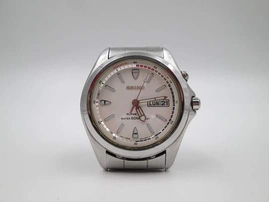 Seiko Kinetic. Acero inoxidable. Día y fecha. Brazalete. Dial blanco. Japón. 1990