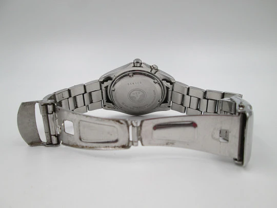 Seiko Kinetic. Acero inoxidable. Día y fecha. Brazalete. Dial blanco. Japón. 1990