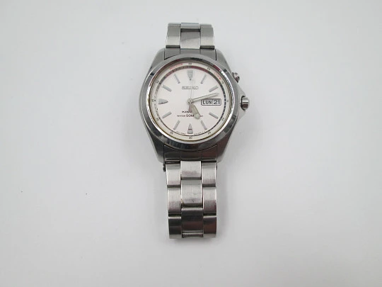 Seiko Kinetic. Acero inoxidable. Día y fecha. Brazalete. Dial blanco. Japón. 1990