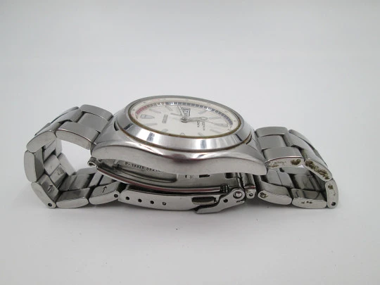 Seiko Kinetic. Acero inoxidable. Día y fecha. Brazalete. Dial blanco. Japón. 1990