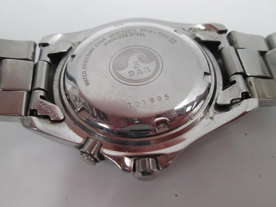 Seiko Kinetic. Acero inoxidable. Día y fecha. Brazalete. Dial blanco. Japón. 1990