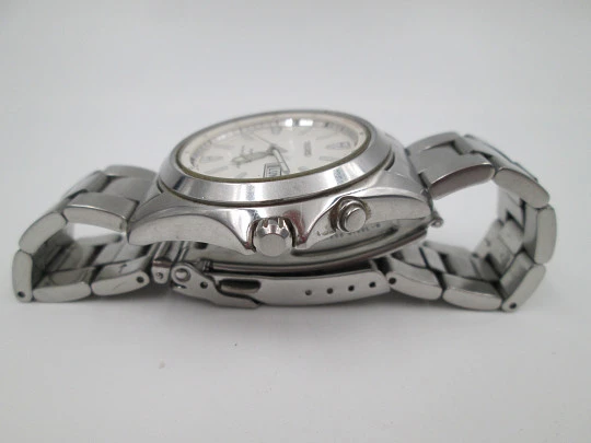 Seiko Kinetic. Acero inoxidable. Día y fecha. Brazalete. Dial blanco. Japón. 1990