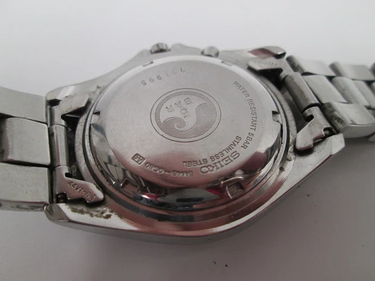 Seiko Kinetic. Acero inoxidable. Día y fecha. Brazalete. Dial blanco. Japón. 1990