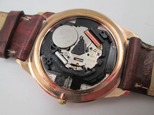 Seiko men's dress quartz watch. Gold plated and stainless steel. Calendar. Japan. 1980's Seiko men's dress quartz watch. Gold plated and stainless steel. Calendar. Japan. 1980's