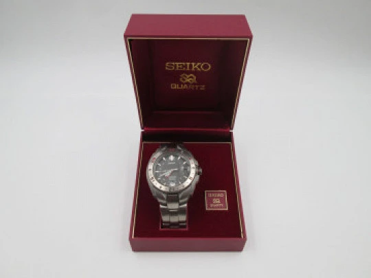 Seiko Perpetual Calendar GMT Titanium. Bracelet. Quartz. 100 meters. Box. 2003's