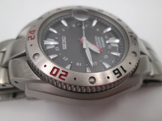 Seiko Perpetual Calendar GMT Titanium. Bracelet. Quartz. 100 meters. Box. 2003's