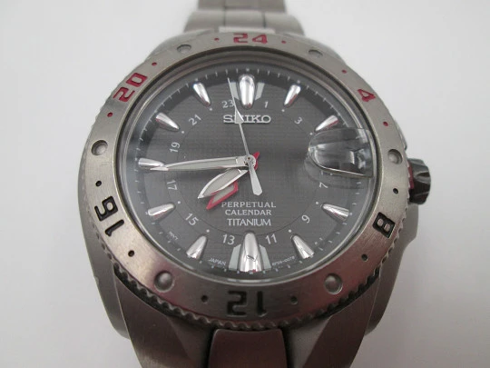 Seiko Perpetual Calendar GMT Titanium. Bracelet. Quartz. 100 meters. Box. 2003's