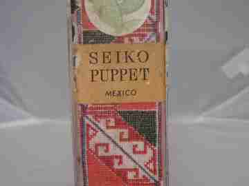 Seiko Puppet. Japón. Años 70. Cuerda. Alarma. Forma libro