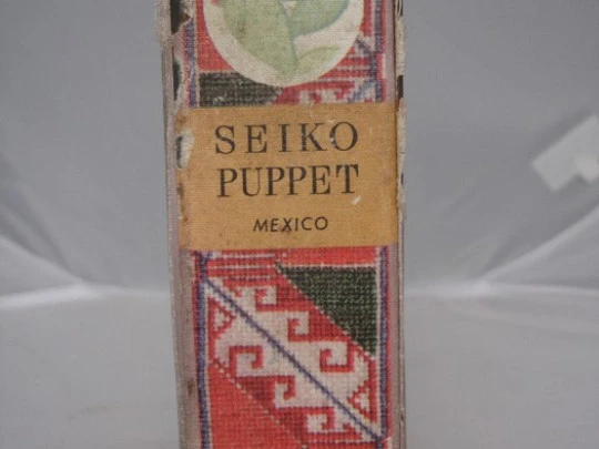 Seiko Puppet. Japón. Años 70. Cuerda. Alarma. Forma libro