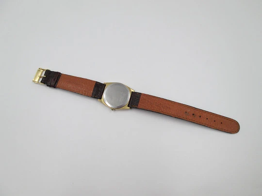 Seiko. Gold plated and stainless steel. Quartz movement. Rectangular case. Japan. 1980's