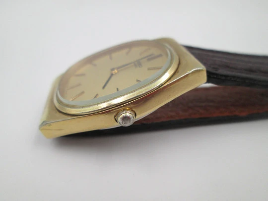 Seiko. Gold plated and stainless steel. Quartz movement. Rectangular case. Japan. 1980's