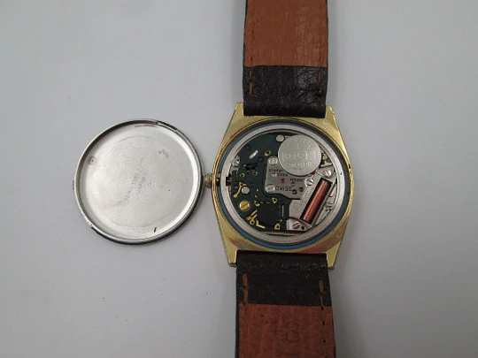 Seiko. Gold plated and stainless steel. Quartz movement. Rectangular case. Japan. 1980's