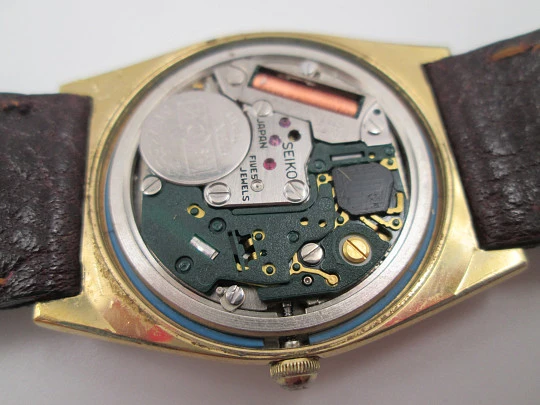 Seiko. Gold plated and stainless steel. Quartz movement. Rectangular case. Japan. 1980's