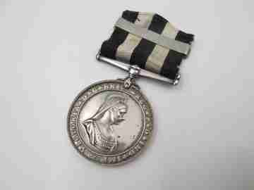 Service Medal of the Order of St. John. Sterling silver. Queen Victoria. Bitone ribbon. 1941