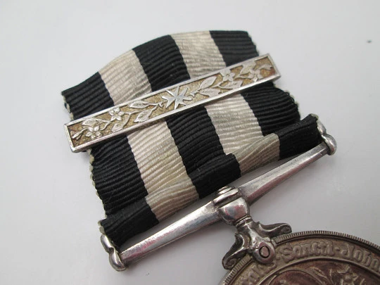 Service Medal of the Order of St. John. Sterling silver. Queen Victoria. Bitone ribbon. 1941