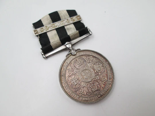 Service Medal of the Order of St. John. Sterling silver. Queen Victoria. Bitone ribbon. 1941