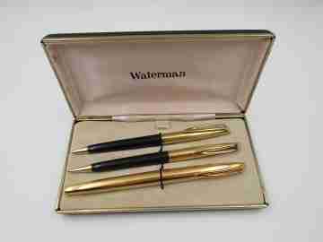 Set escritura Waterman C / F. Plástico negro y laminados oro. Estuche. 1950