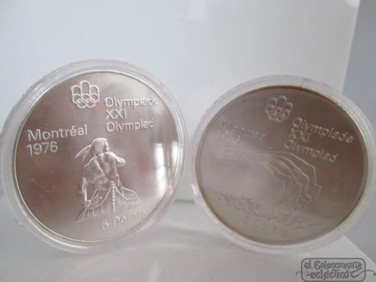 Set four sterling silver coins. Box. 1970's. Canada Olympics. Dollars
